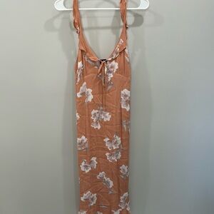 Peach floral dress with tie at bust